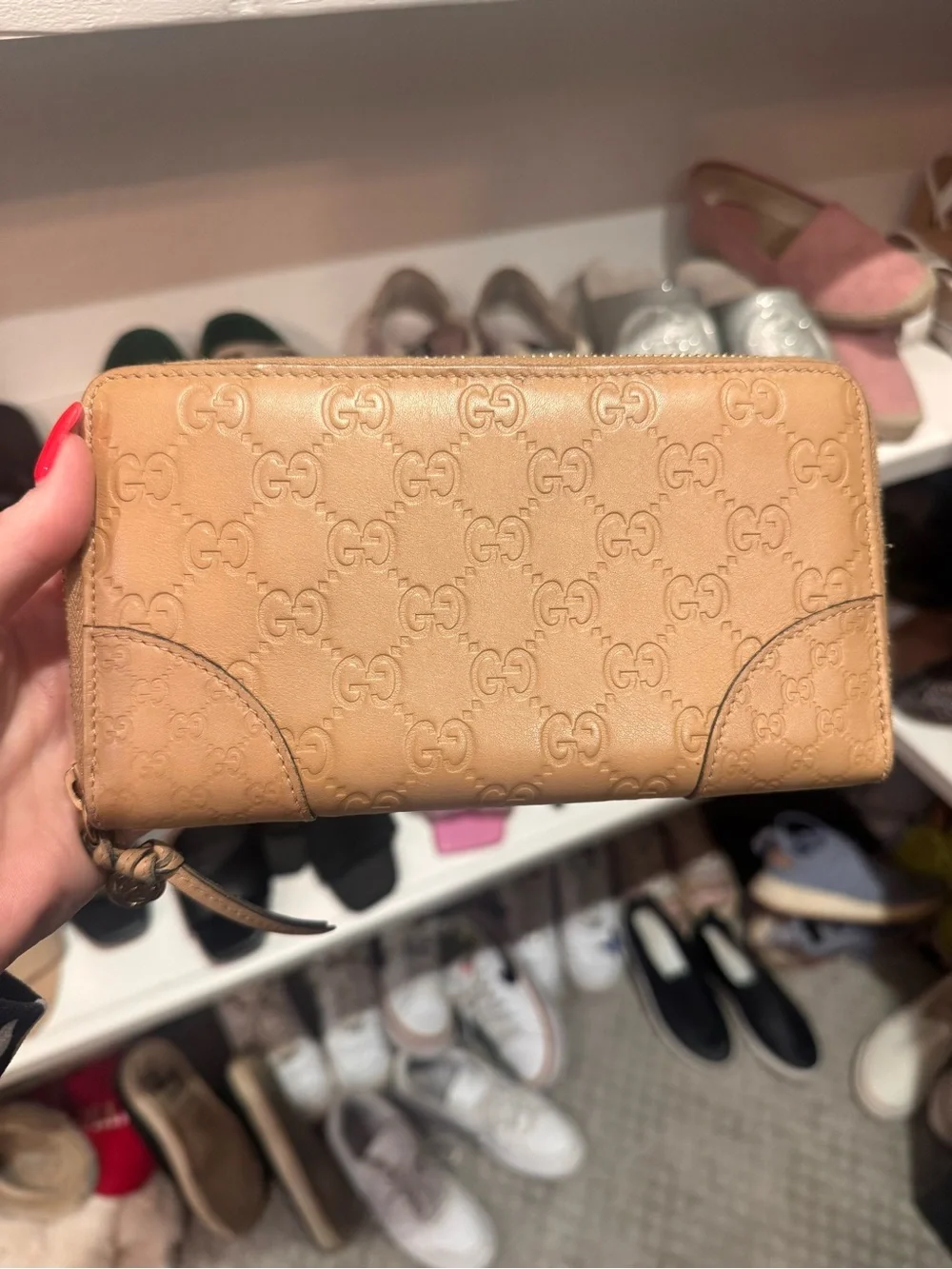 Gucci Beige Embossed GG Zip-Around Leather Wallet